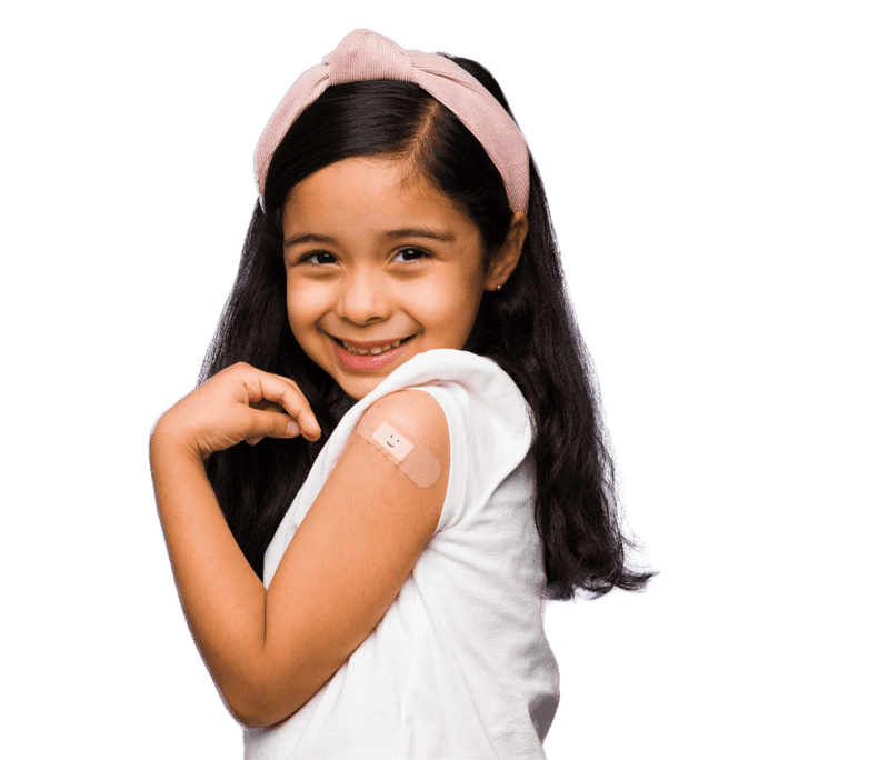 Smiling girl showing a bandage on her left arm